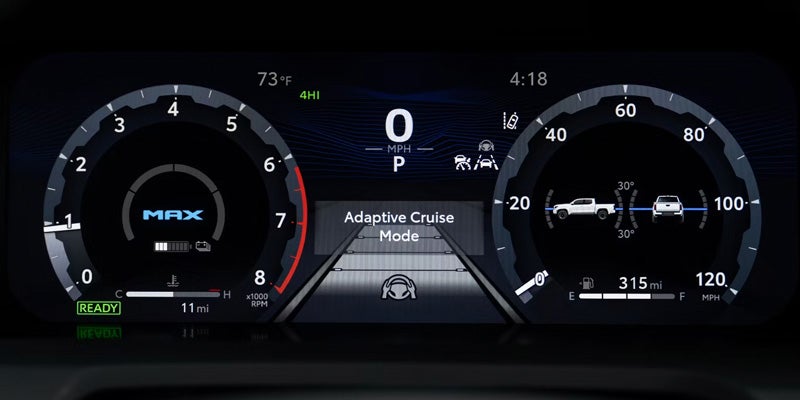 The dashboard loaded with safety features in the 2025 Toyota Tacoma in Pleasant Hills, PA