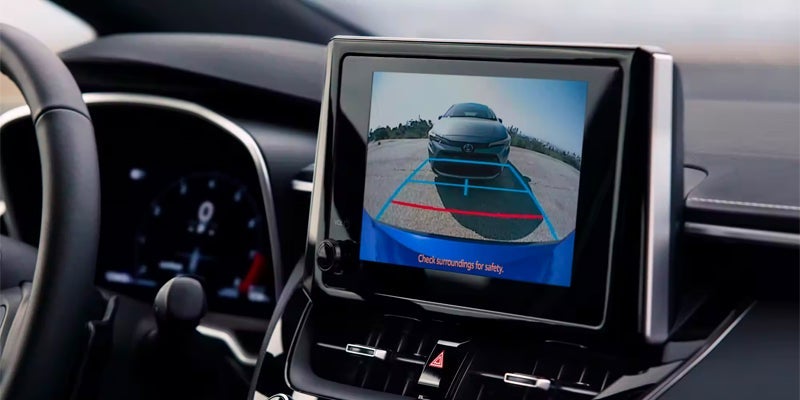 Vehicle backup camera display with parking guide lines.